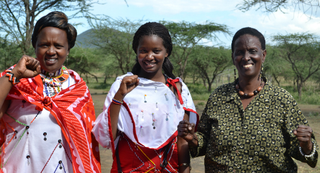Nice Nailantei Leng'ete with Masai women in Magadi, Kenya, at the close of a 2013 alternative rites of passage ceremony (Anja Legtenberg)
